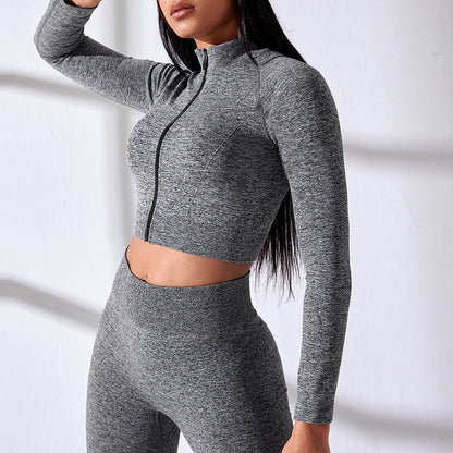 Sportset met crop top met lange mouwen en legging met rits