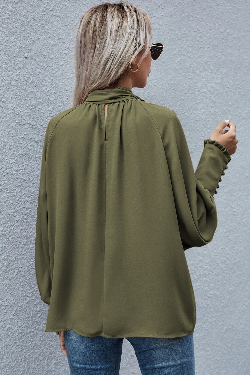 Mora - Blouse met bindceintuur en franjes en bisschopsmouwen