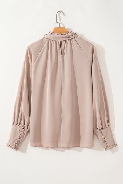 Mora - Blouse met bindceintuur en franjes en bisschopsmouwen