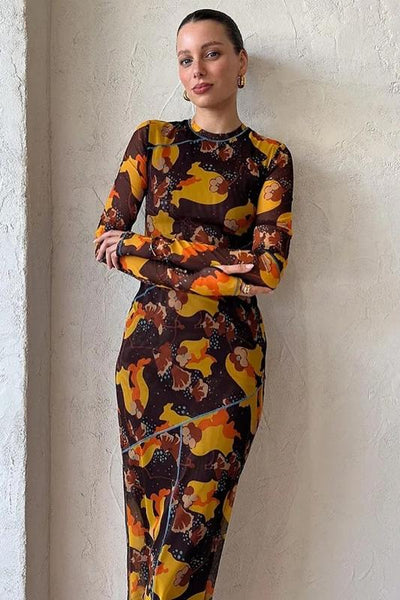 Nina - doorschijnende maxi jurk met print